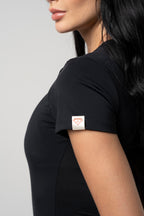 Set Suiza De Body Negro y Sudadera Bota Recta Dorada